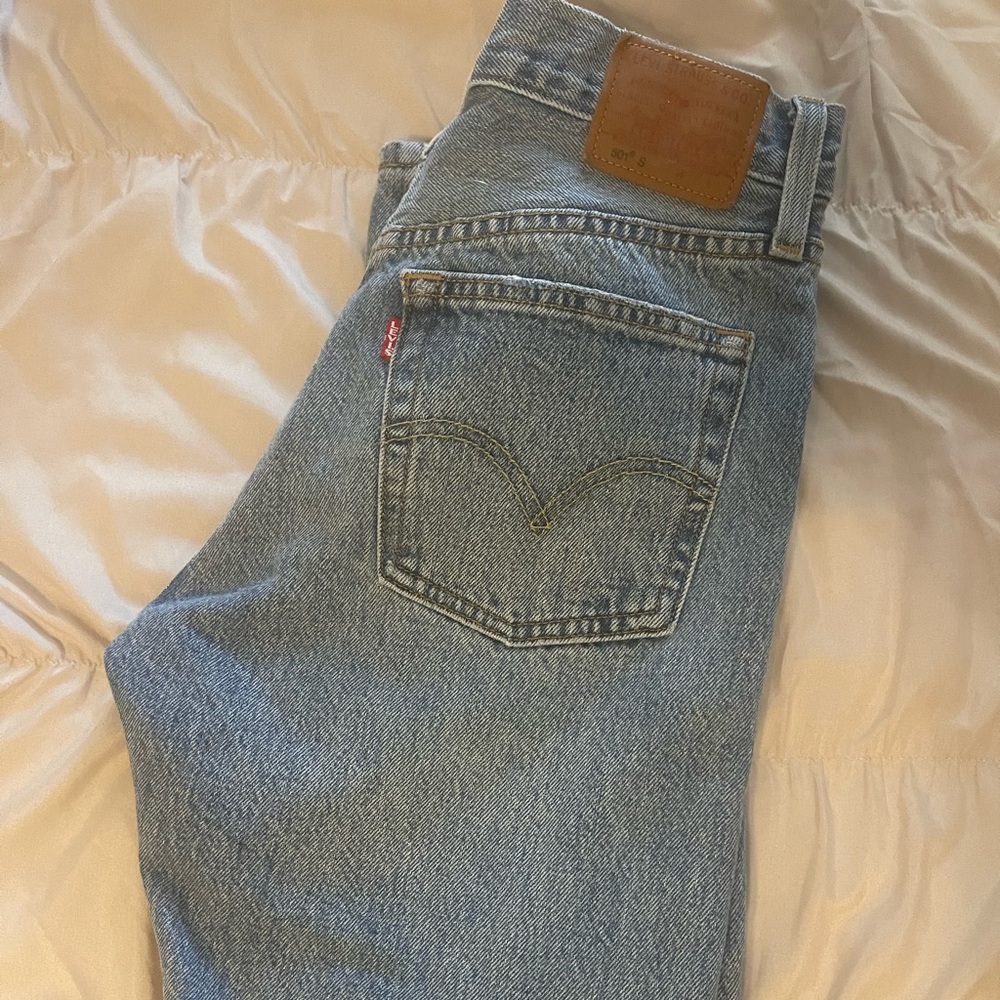 501 skinny distressed light wash jeans